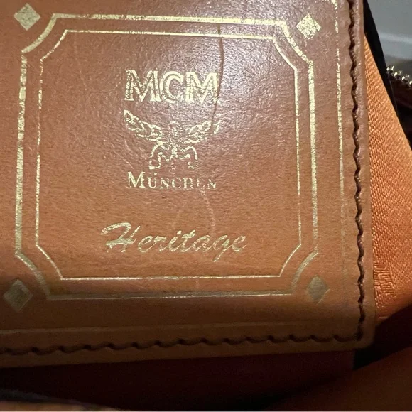 MCM Cognac Visetos Coated Canvas Heritage Boston Bag.